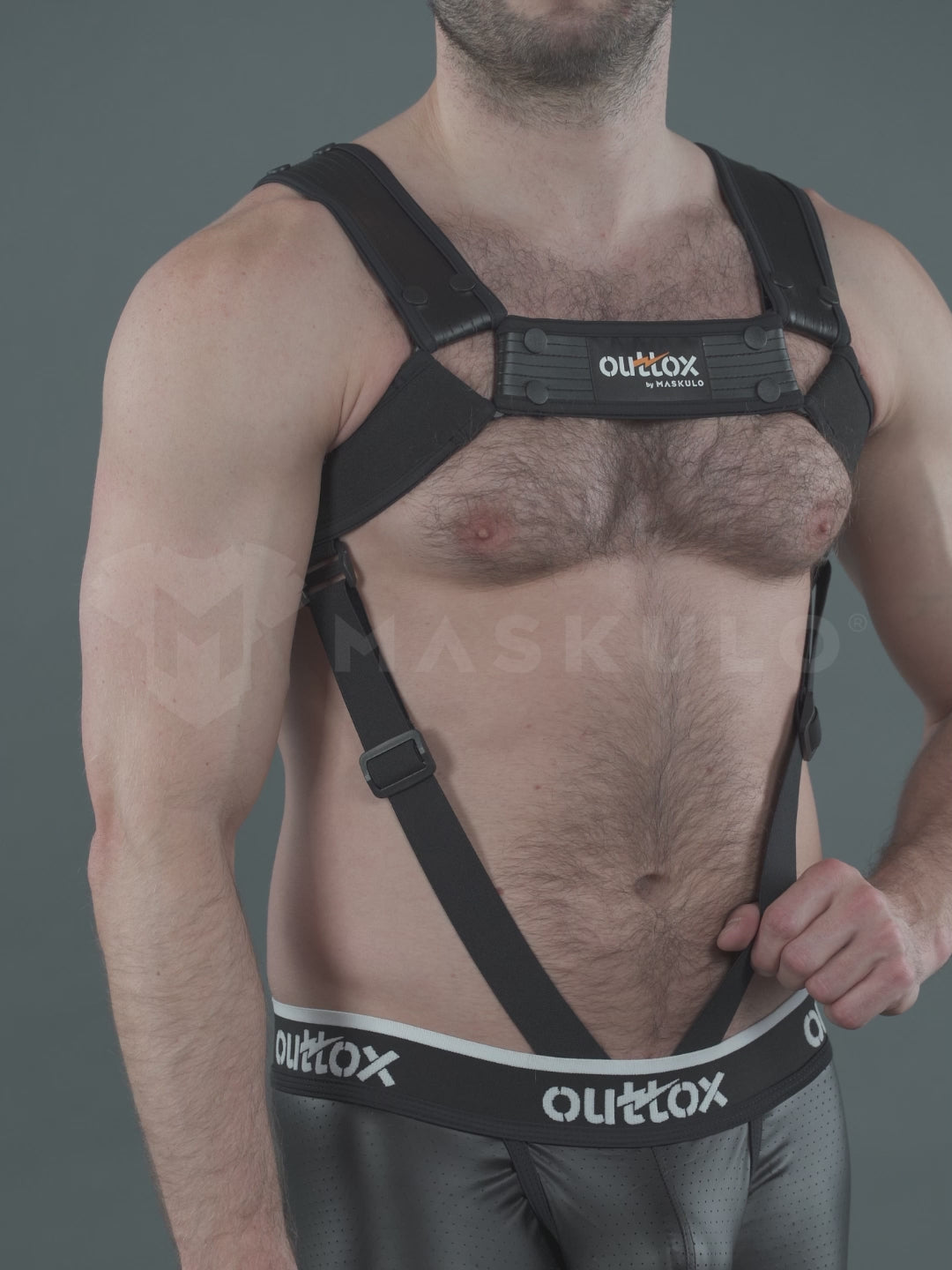 Outtox von Maskulo. Body Harness mit Druckknöpfen. Schwarz