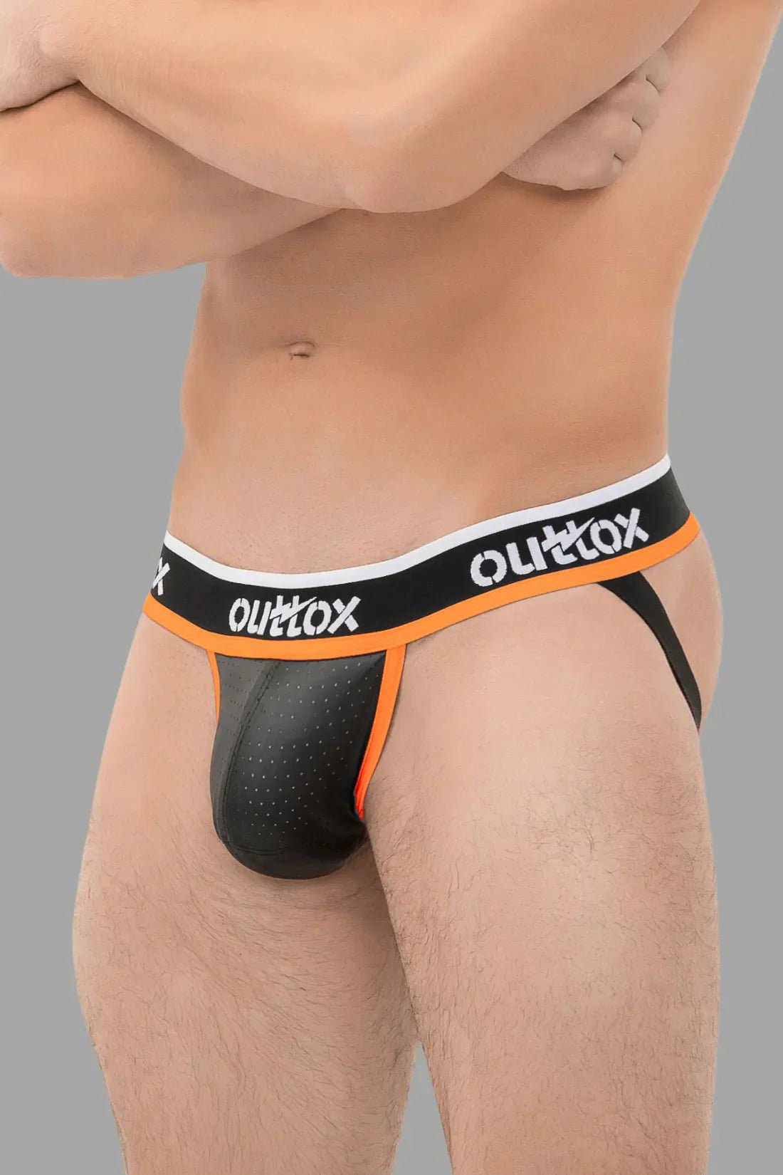 Outtox Black & Orange Jockstrap w/ Snap Codpiece. Polyester/PU eco leather for comfort & breathability. Maskulo Global EU Store.