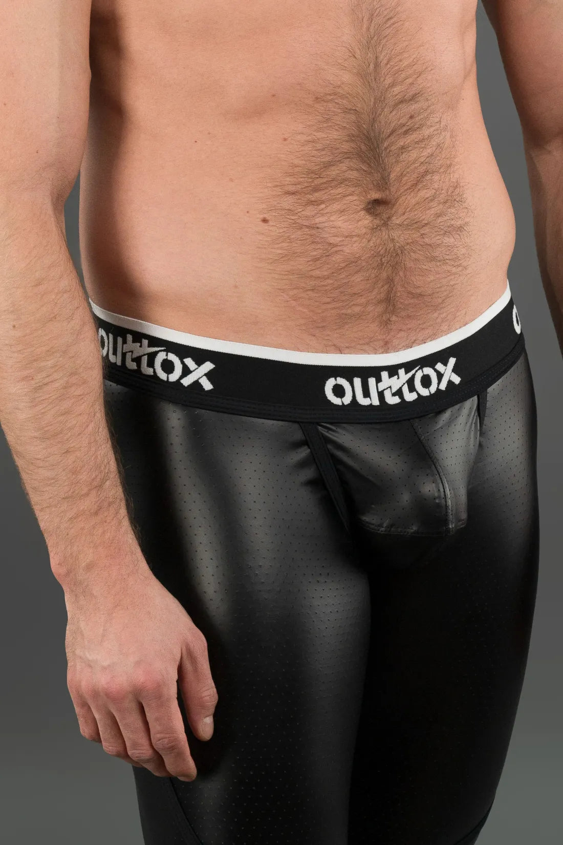 Outtox. Leggings arrière zippés avec pièce à pression. Noir