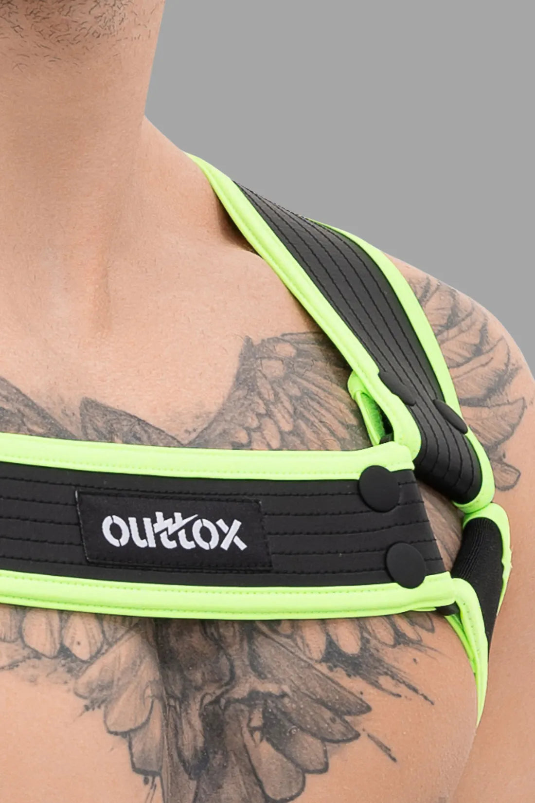 Outtox. Bodyharnas met drukknopen. Zwart+Groen &