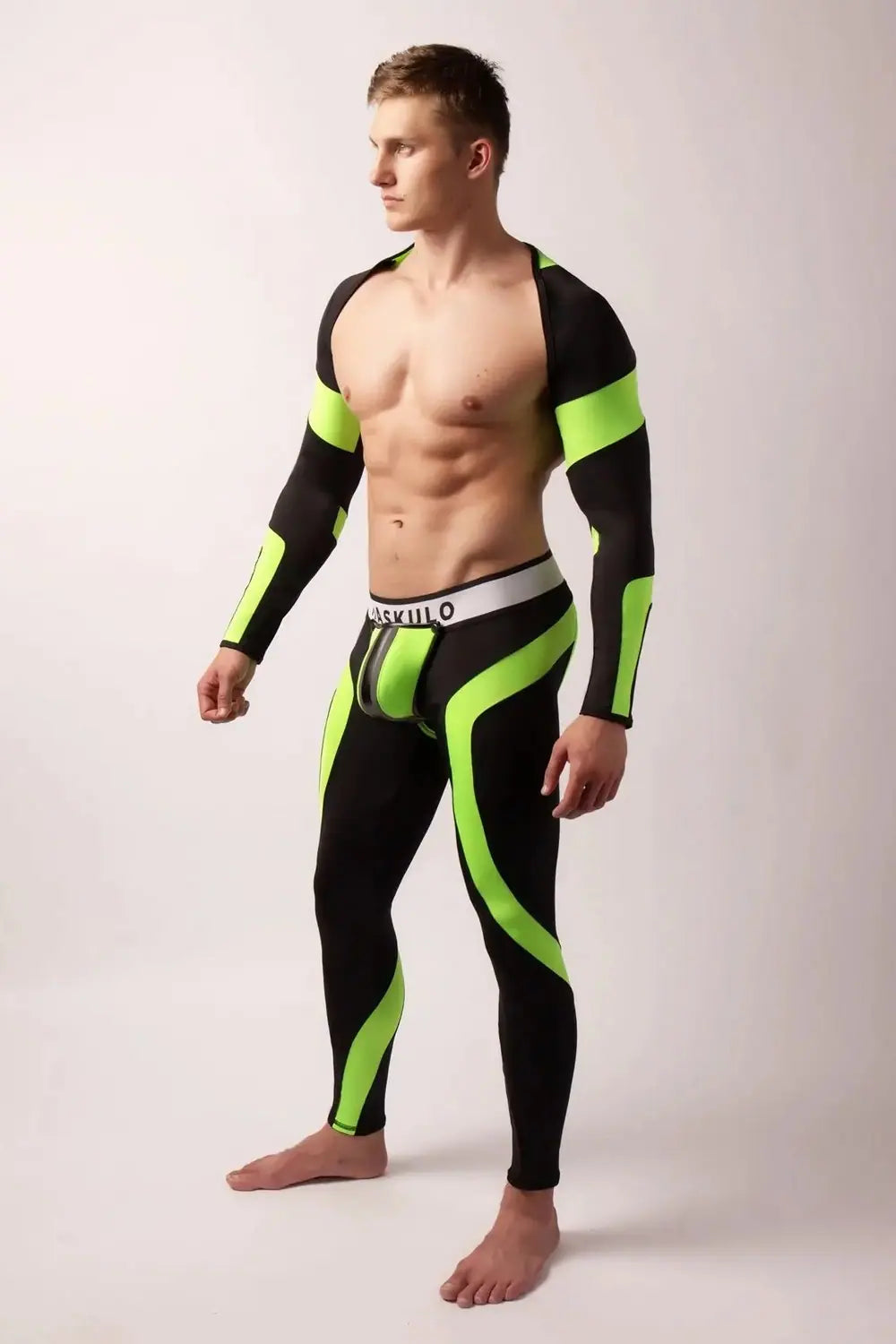 Maskulo green-neon and black UV-glowing spandex long sleeve crop top fetish shirt for leather subculture
