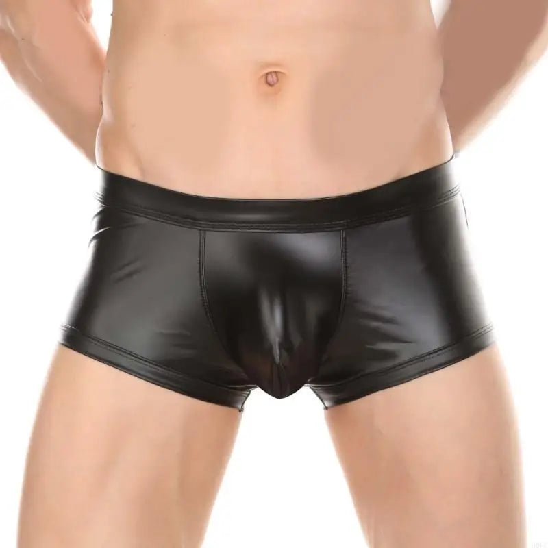 Maskulo MSH285 black PU leather mini shorts with open rear and bulge pouch, ideal for daily wear, gym, or sports.