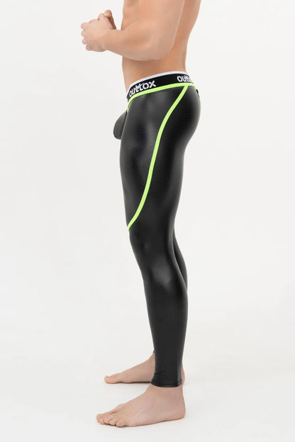 Outtox. Legging met rits aan de achterkant en drukknoopsluiting. Zwart+Groen &